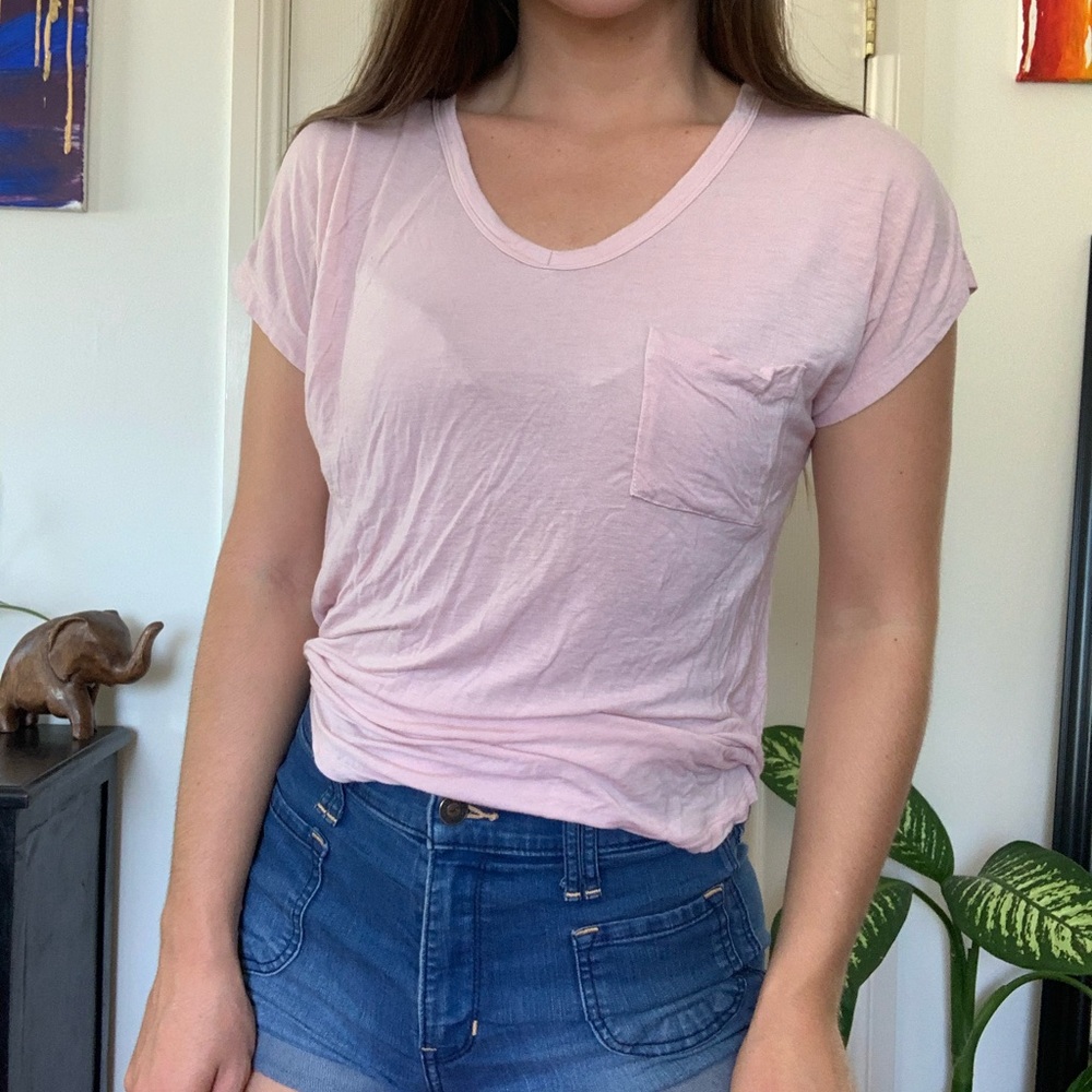 Pocket tee with detail on back